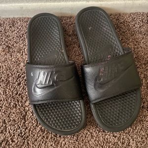 Black Nike slides